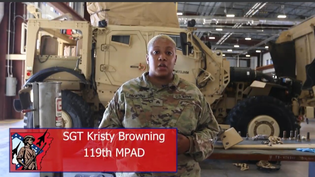 Kristy dressed in camo.