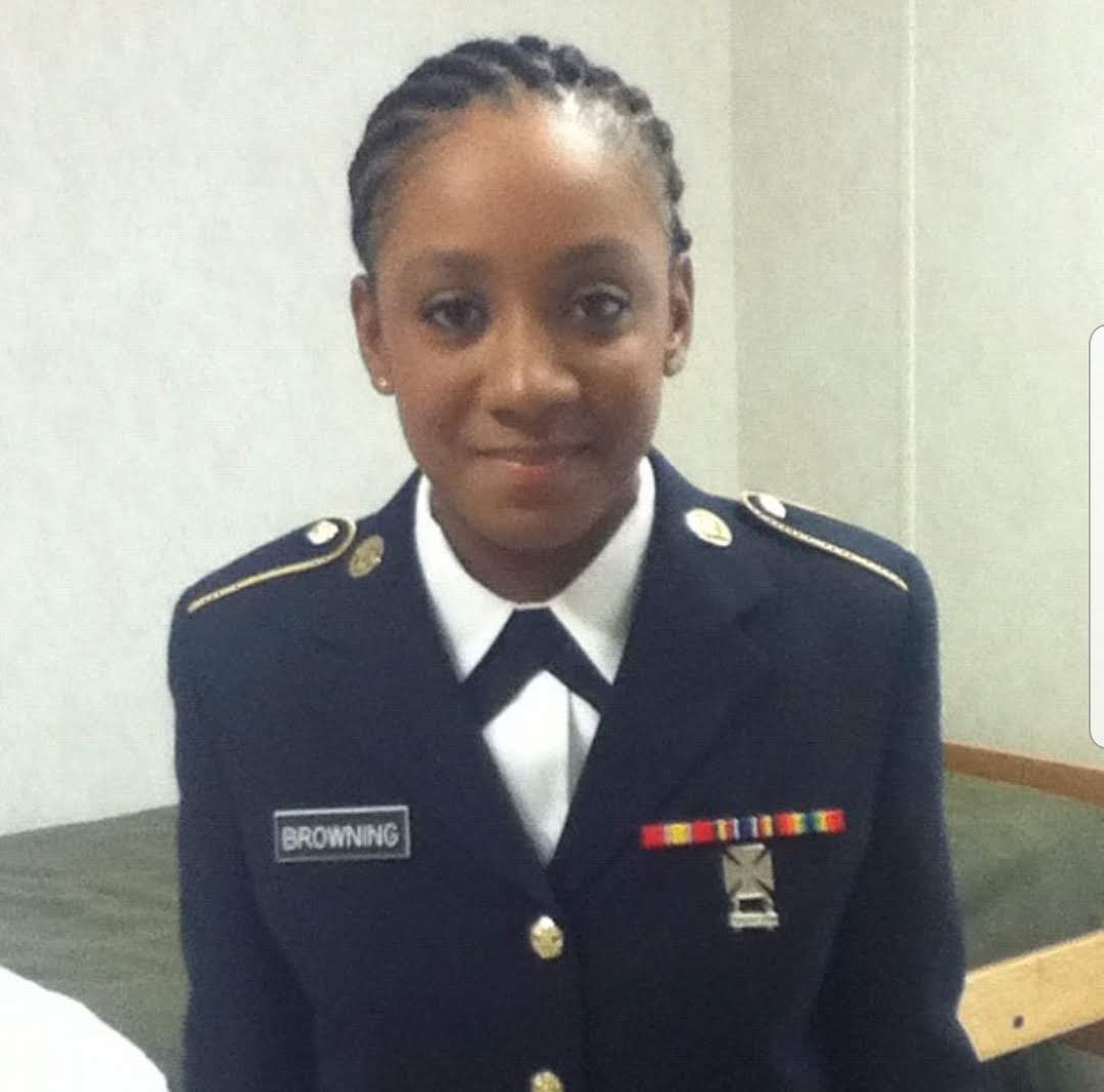 Kristy dressed in miltary univorm.