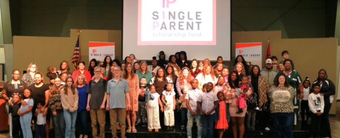 Group photo of scholarship recipients and their families
