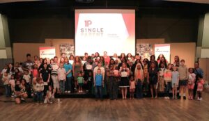 Group of aspsf reciepients and their families at a ceremony