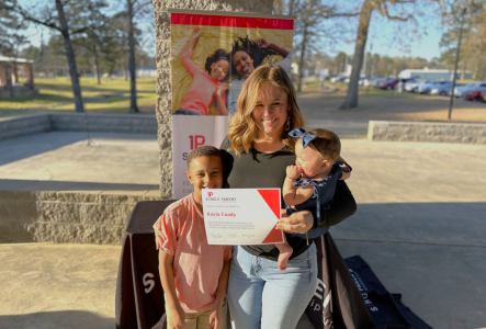 ASPSF recipient, Kayla Coady, pictured with her certificate and two children
