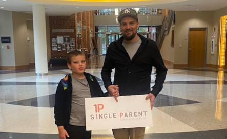 Zachary Brown with his son