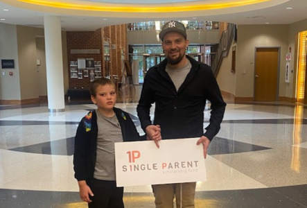 Zachary Brown with his son