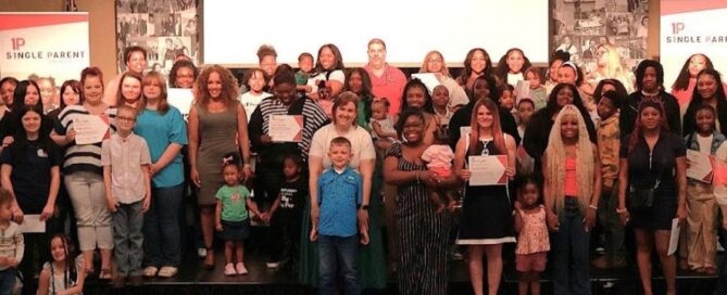 Group of aspsf reciepients and their families at a ceremony